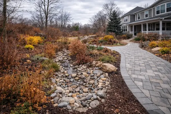 Stormproof landscape design with native plants and rain garden